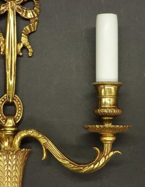 Pair of Louis XVI style knot wall lights - gilded bronze