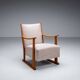 Oak armchair with curved armrests