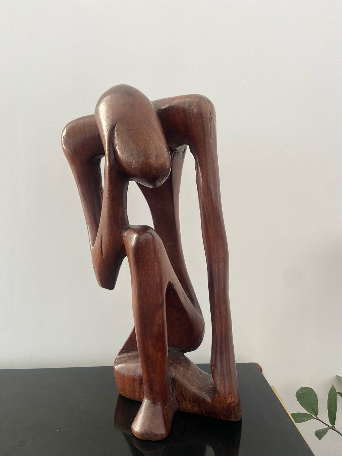 Wooden sculpture the Thinker