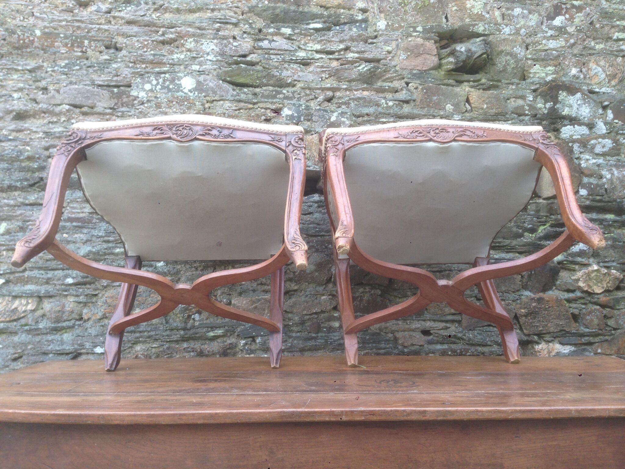 Pair of Louis XV-style walnut armchairs