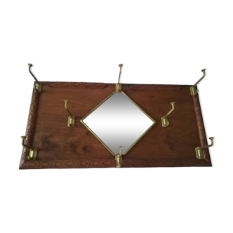 Old wooden wall coat rack with diamond mirror