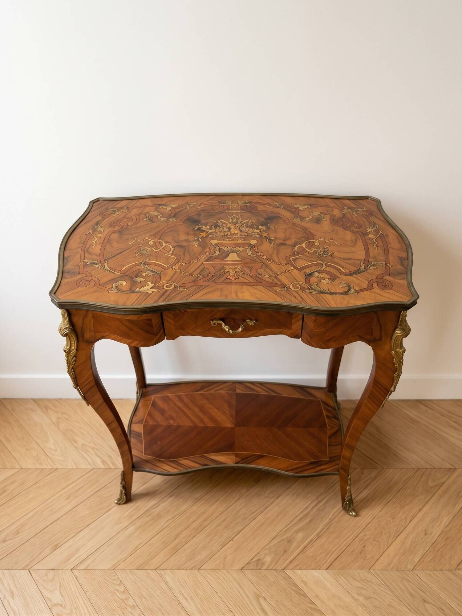 Louis XV console table with marquetry and bronze fittings.