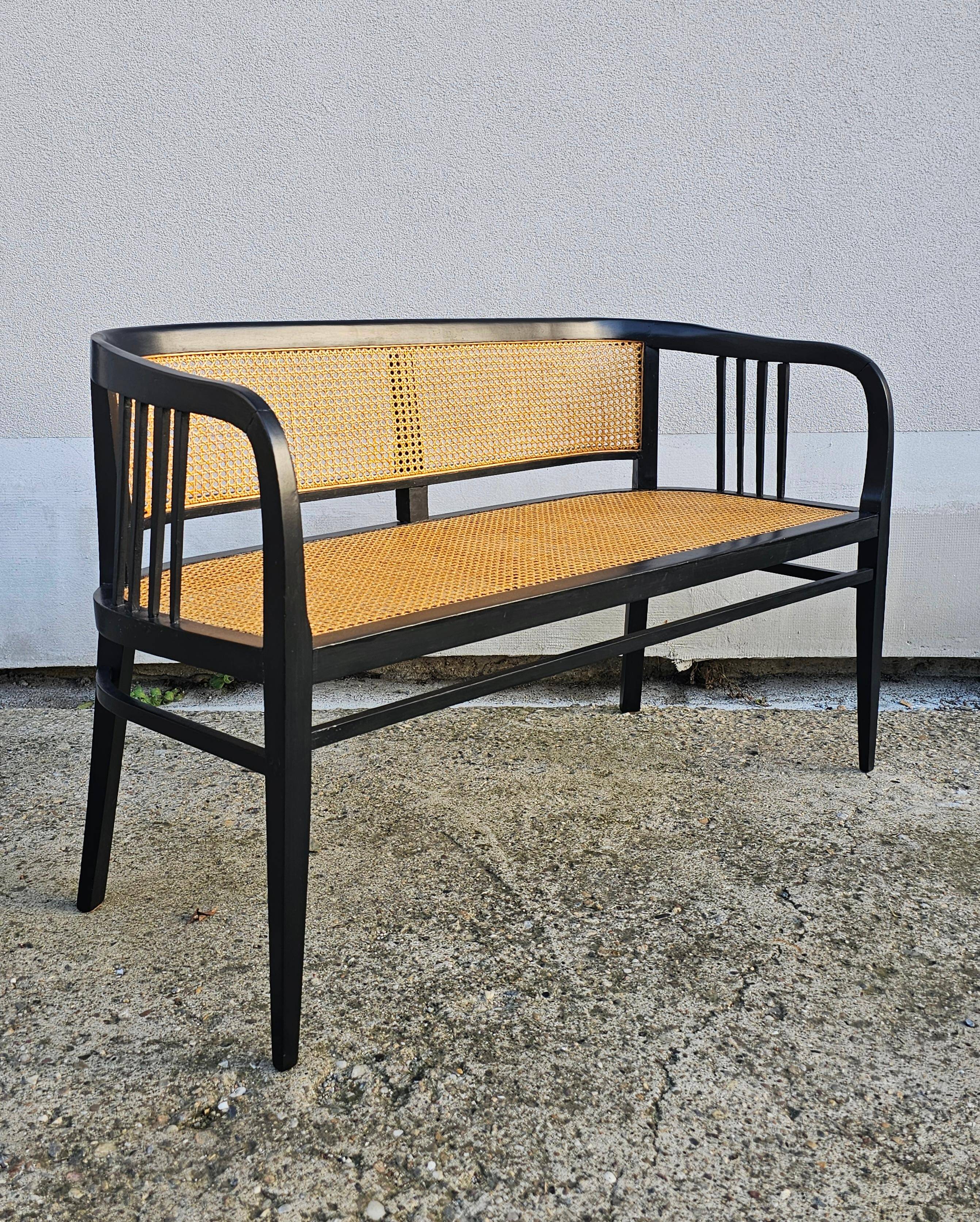 Vienna Secession beech canapé with cane seat and backrest.