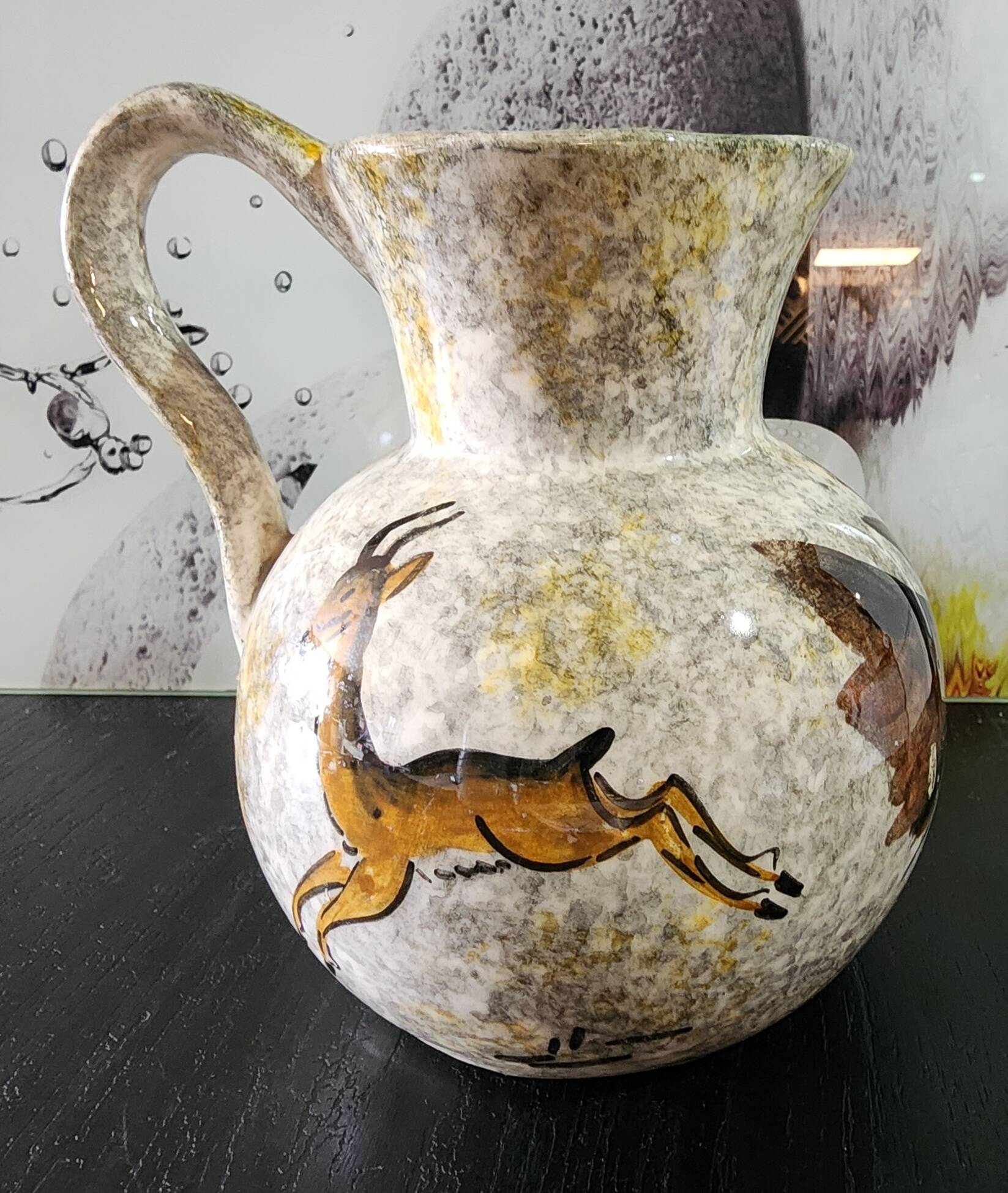 set of jug and ceramic cup handmade decorated with gazelle and deer