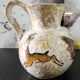 set of jug and ceramic cup handmade decorated with gazelle and deer