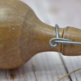 Small wooden sandstone bottle