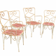 Perforated metal garden chairs and armchairs