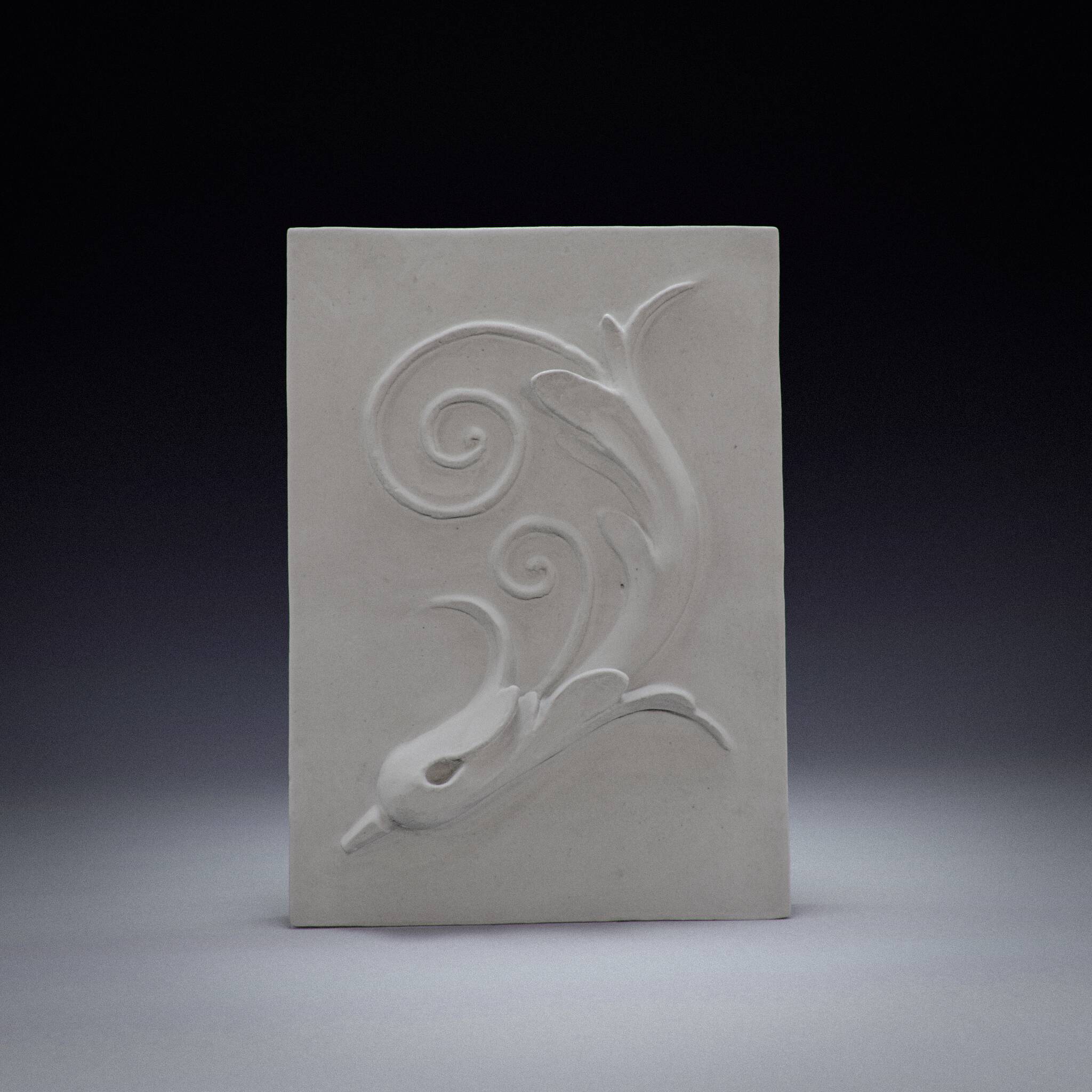 Plaster bas-relief of an acanthus leaf.