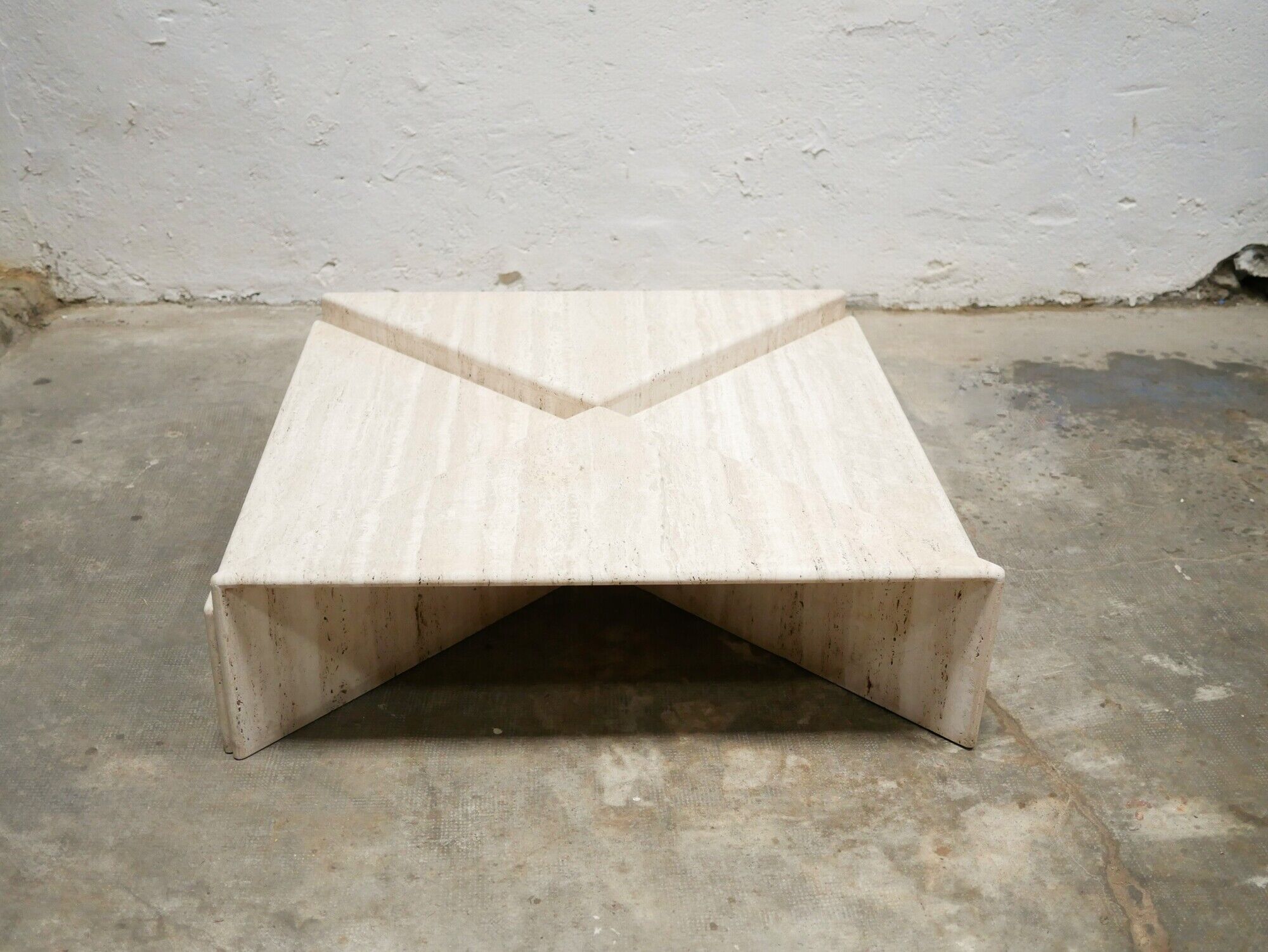 Series of 2 vintage travertine coffee tables published by Roche Bobois