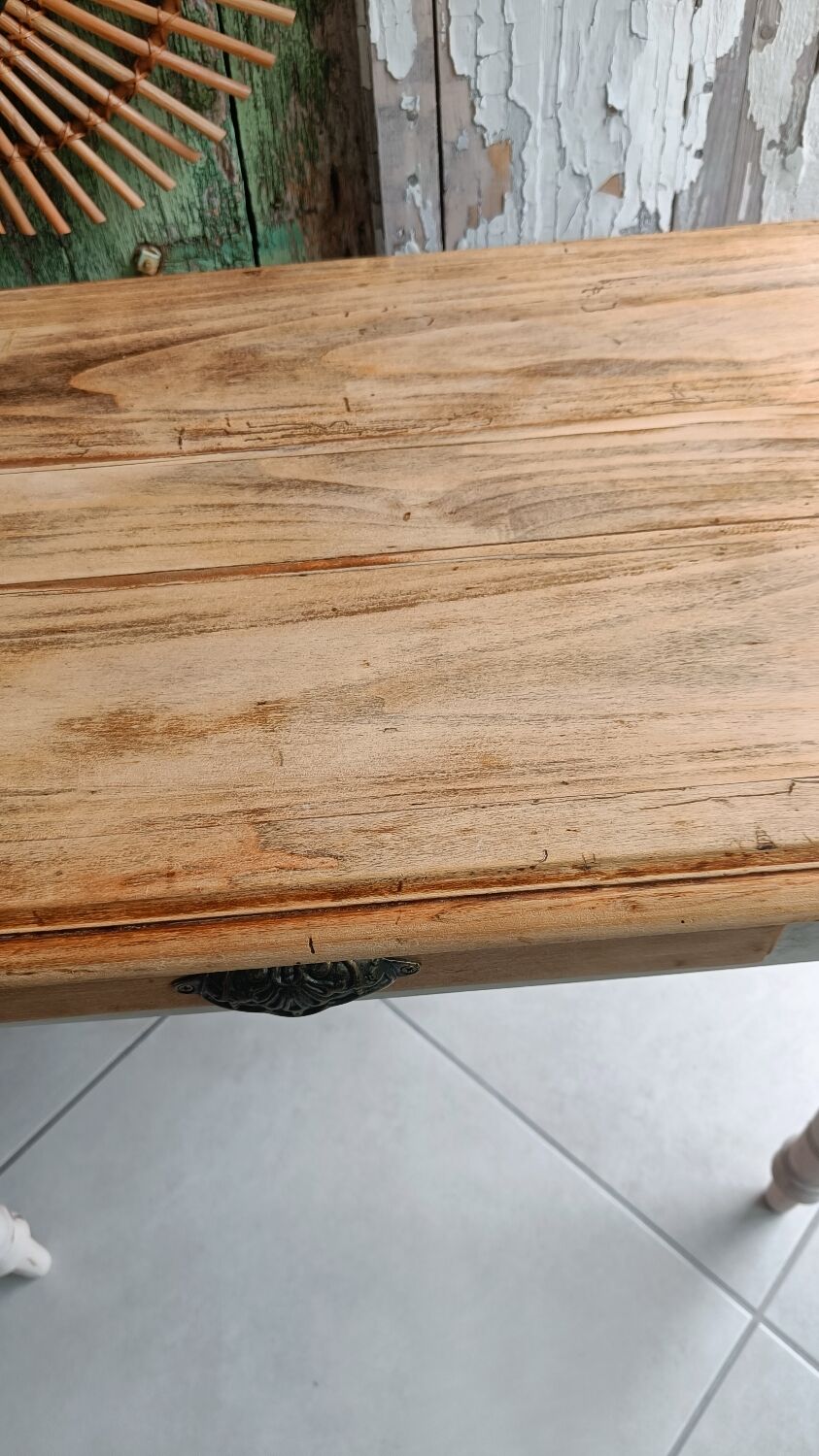 Antique wooden desk with a patinated base