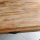 Antique wooden desk with a patinated base