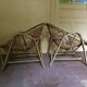 A pair of rattan armchairs