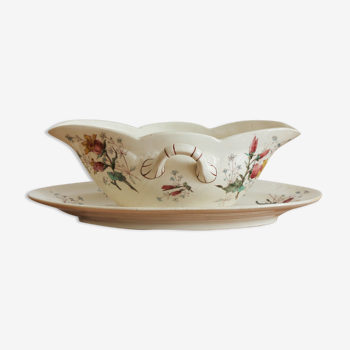 Gravy boat in polychrome iron earthenware of the nineteenth century