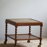 Modern Danish service table with turned spool legs and coloured tiles, 1950s.