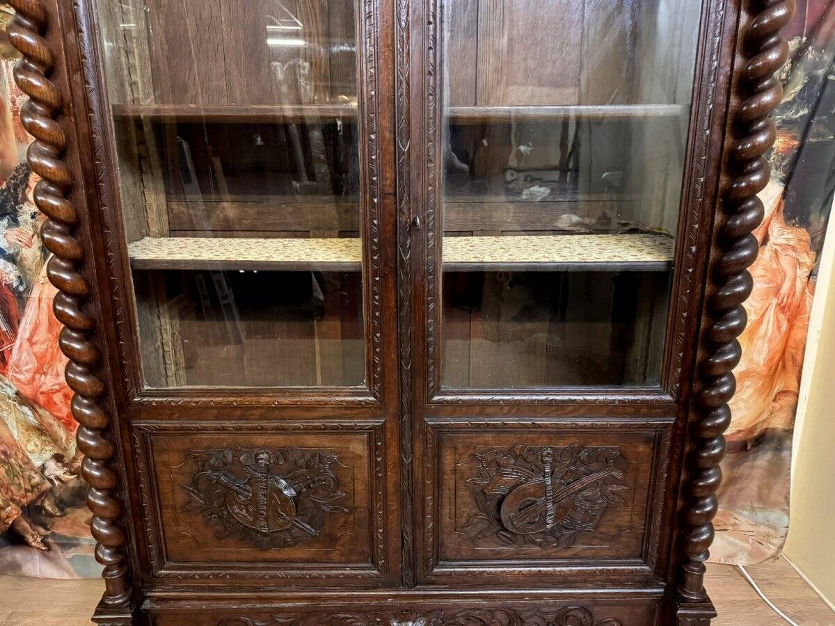 Renaissance style hunting lodge library in carved oak circa