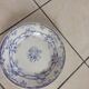 4 plates earthenware, 1940s. White background, Ceres parma décor