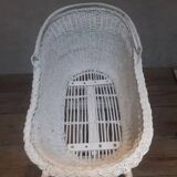 Wicker and painted wood baby cradle