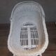 Wicker and painted wood baby cradle