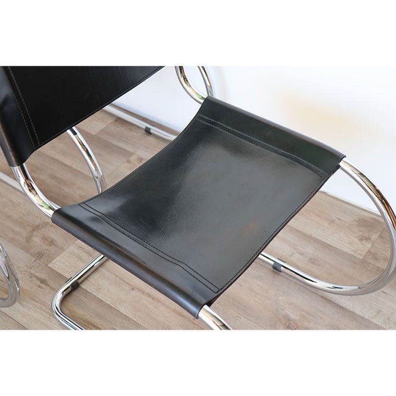 Series of 6 minimalist chairs in chrome metal and black leather around 1970