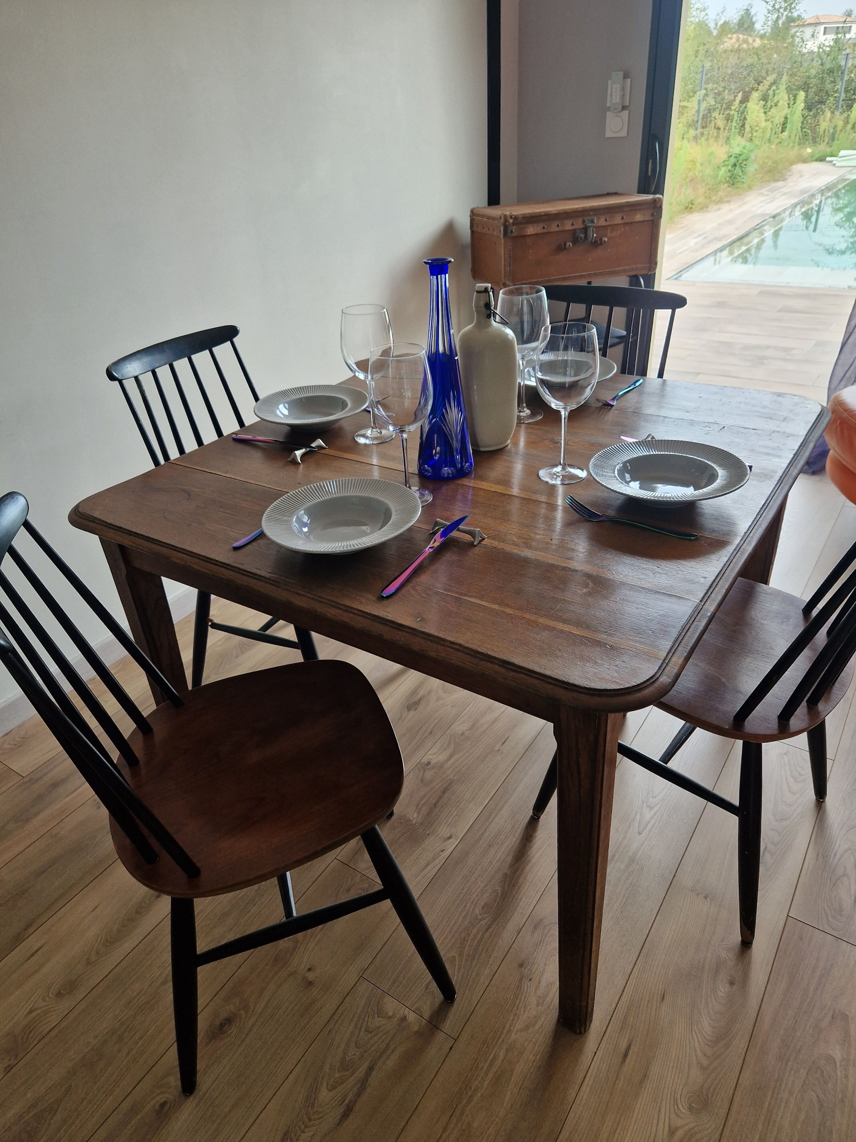 Square art deco dining table in solid wood