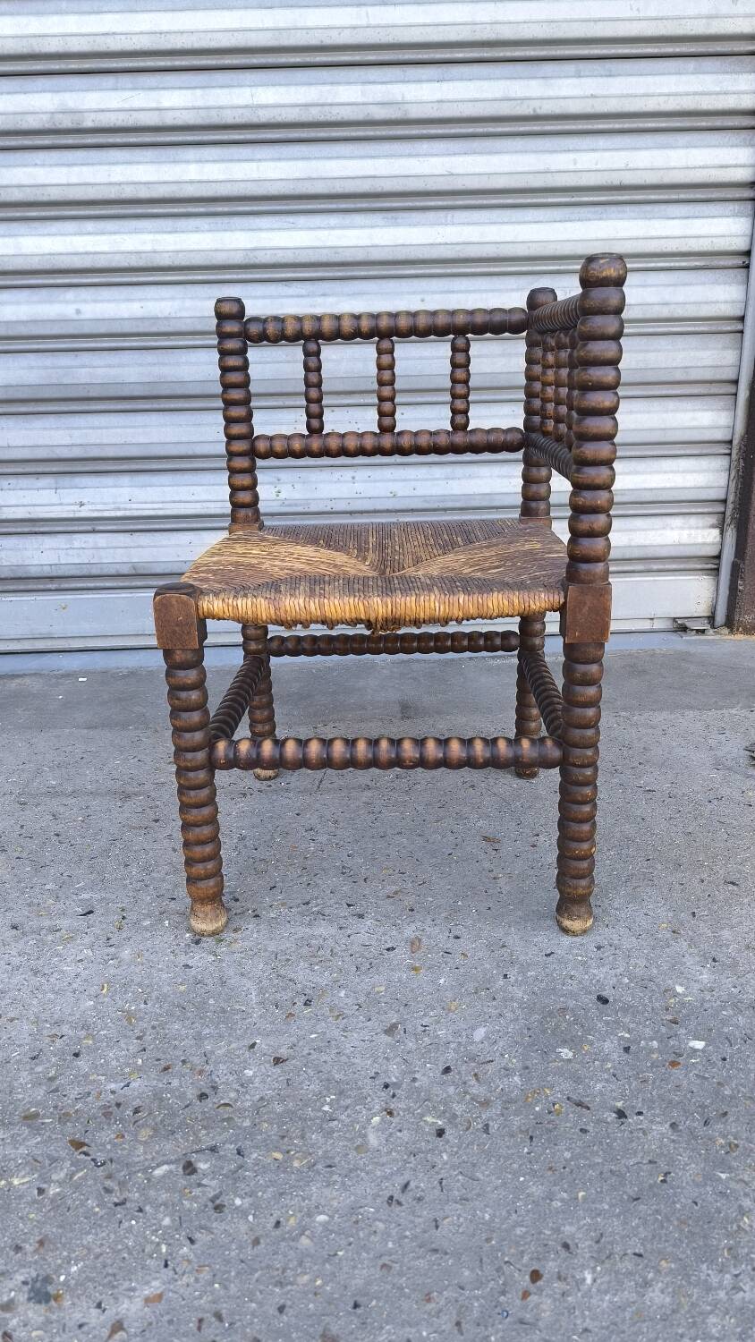 Fauteuil coin du feu en bois tourné début xx ème