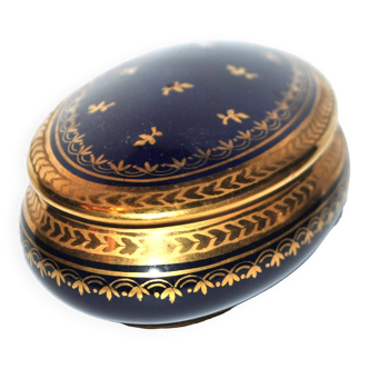 Oval jewelry box in cobalt blue Limoges porcelain and gold frieze