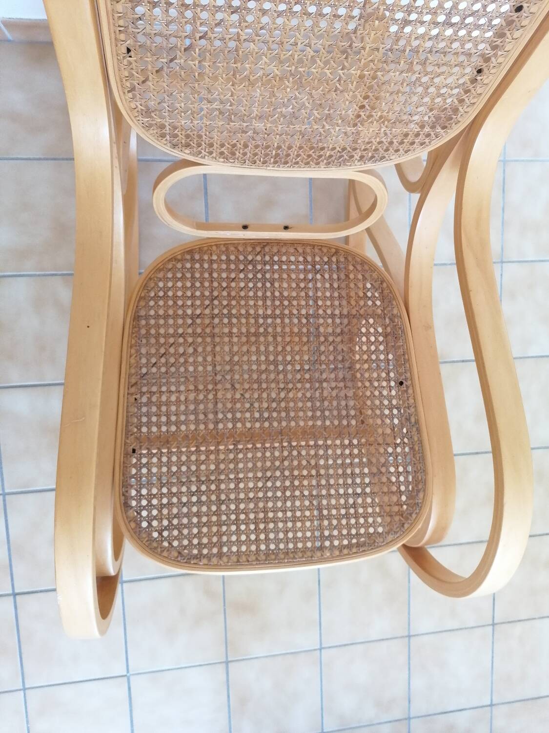 Wooden and cane rocking chair