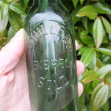Ancienne bouteille de bière Roulleau à Saint Lô (Manche)