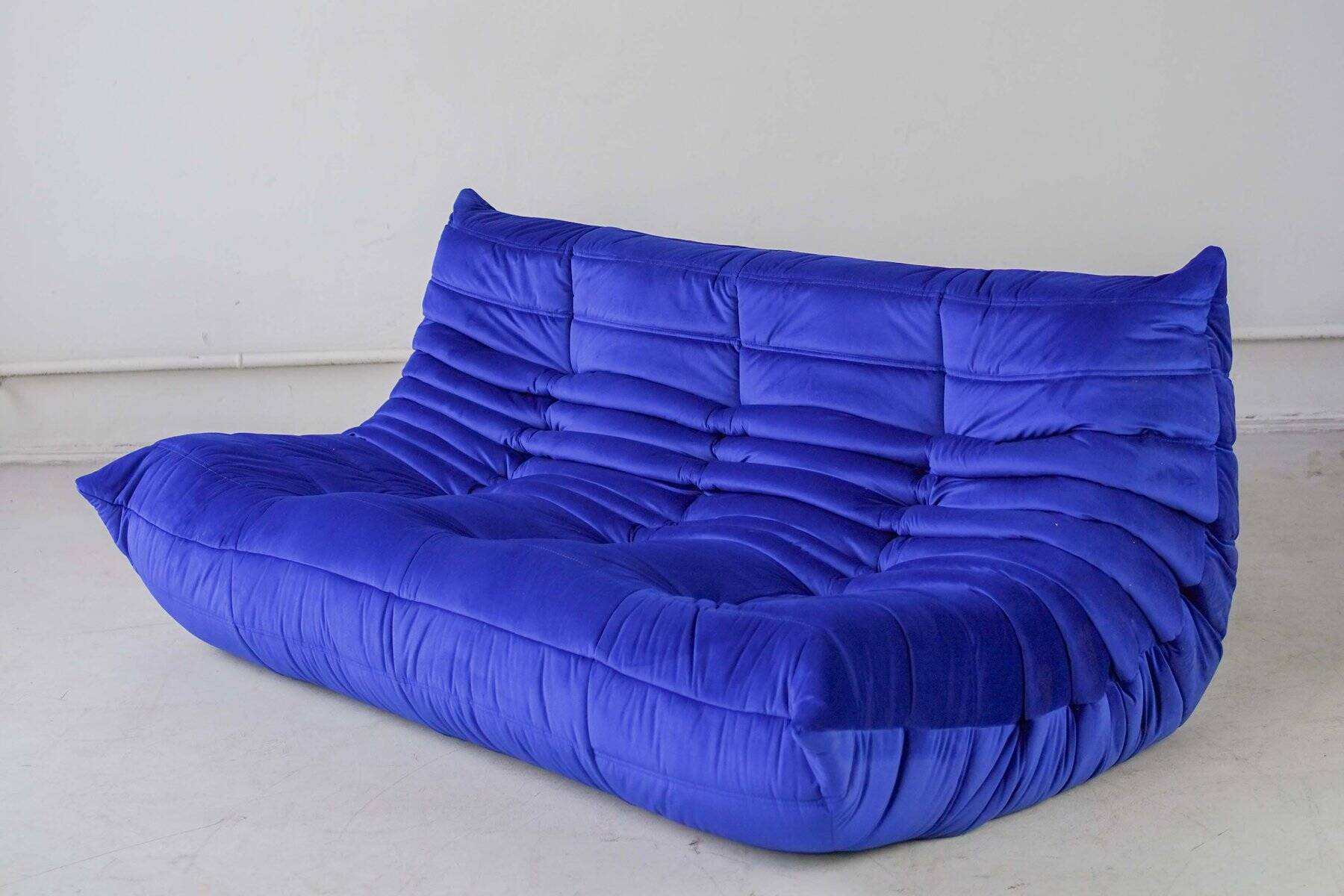 Togo three-seat sofa in blue velvet by Michel Ducaroy for Ligne Roset