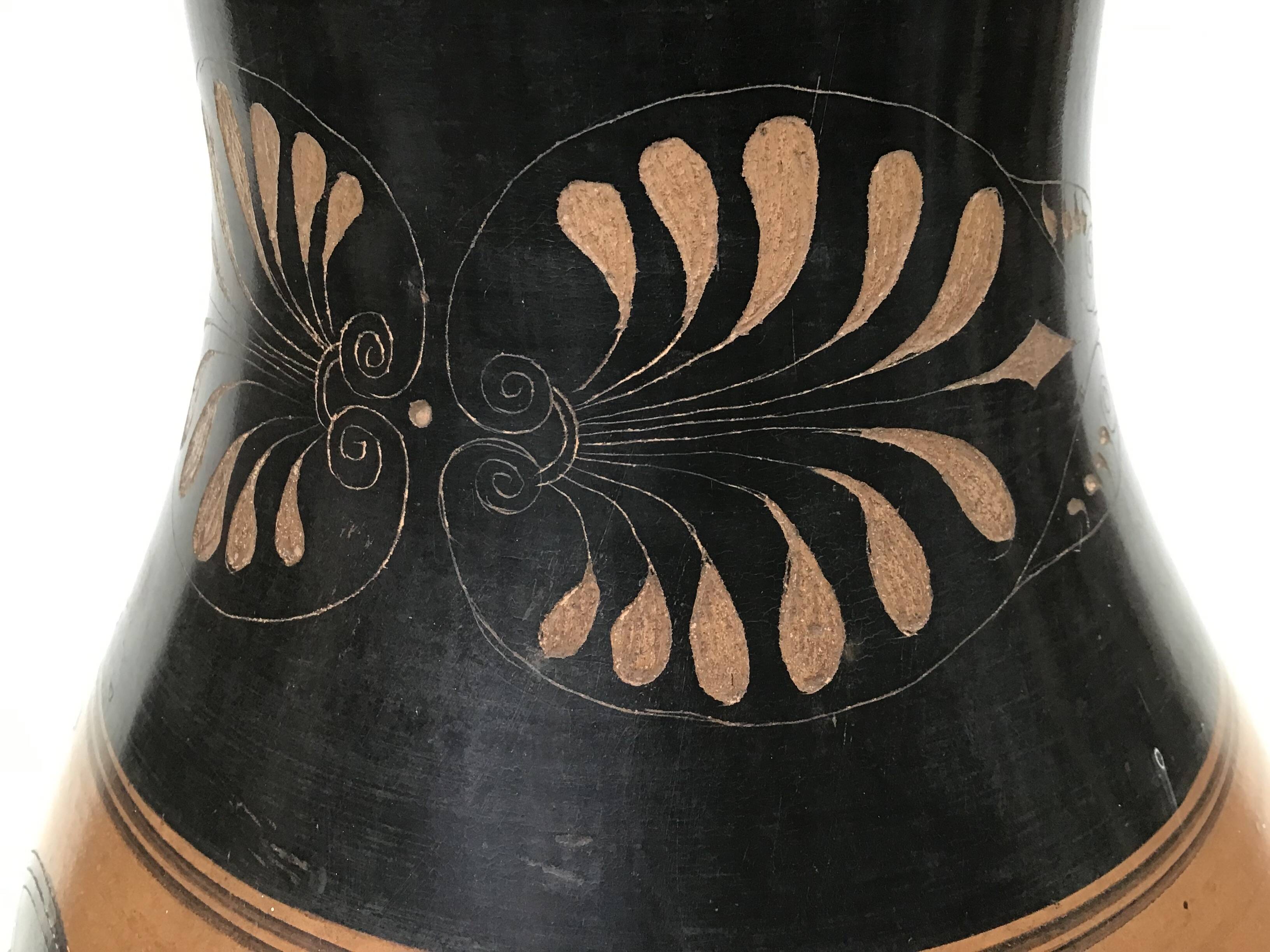 Reproduction of a Greek Attic-style black-figure vase depicting warriors