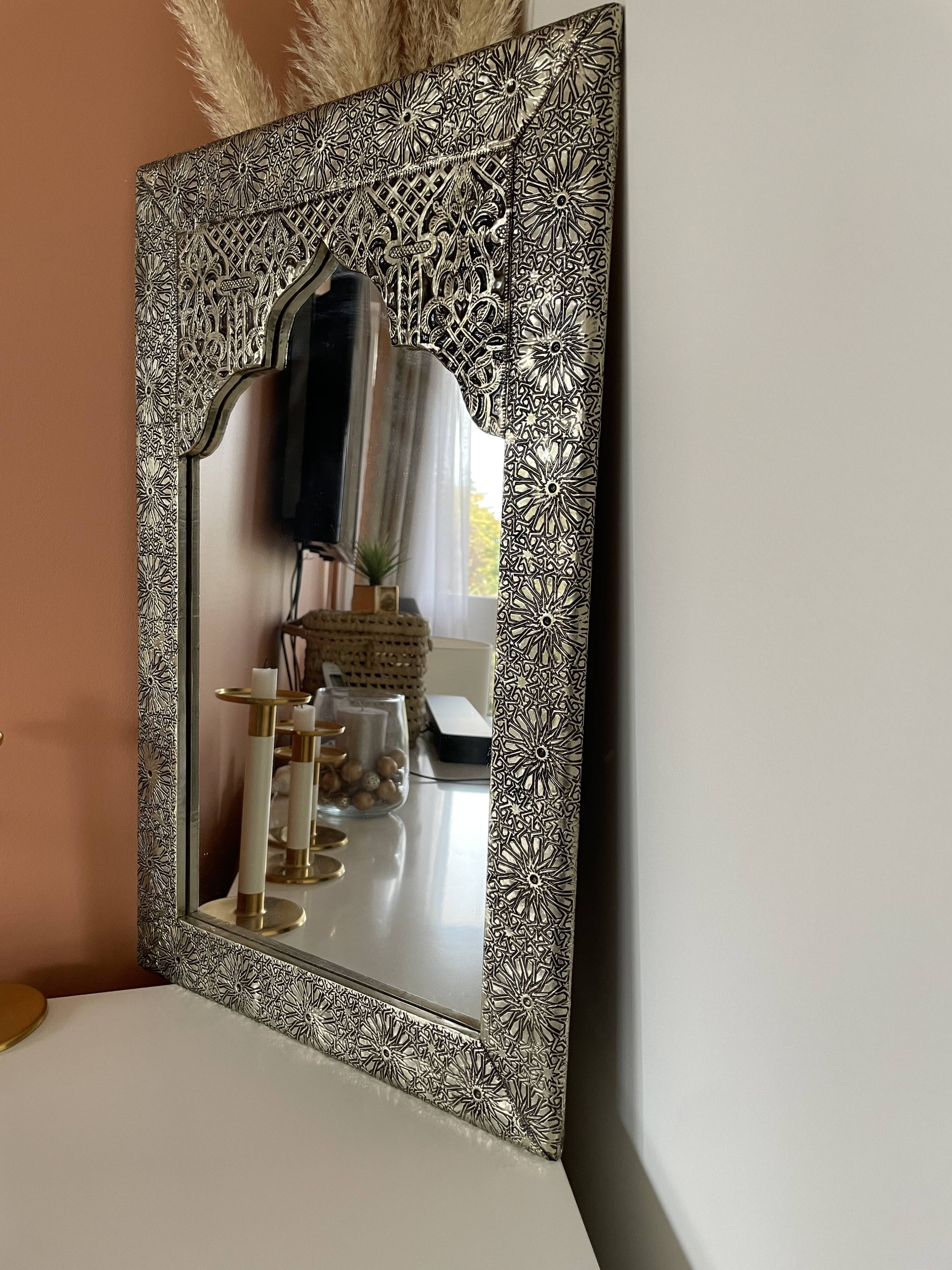 Silver oriental mirror