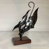 Small metal and wood fish statue