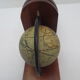 Old pair of greenhouse books in solid wood and world map