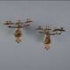 Antique wall sconces in gilded bronze, 20th century, in baroque style.