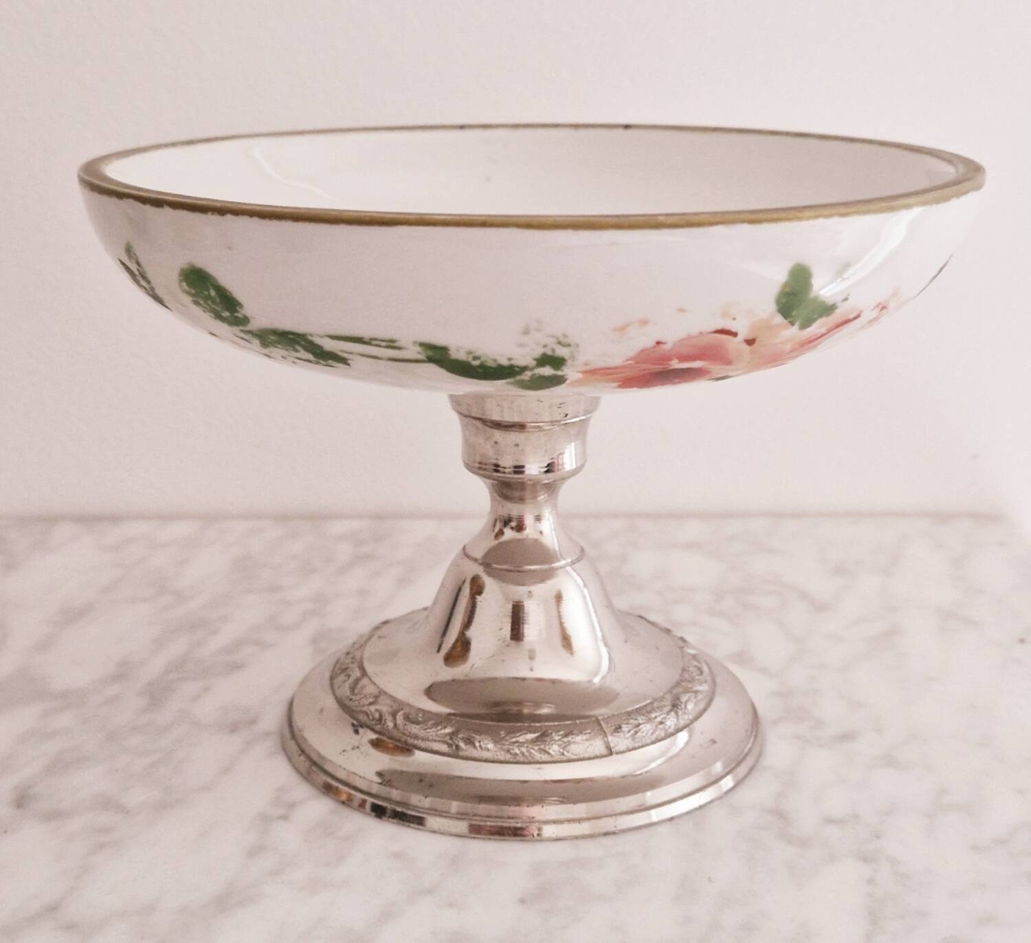 Porcelain cup on silver metal foot