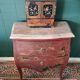 French XIX jumping chest of drawers in Chinese lacquer ox and golden blood
