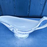 Old earthenware sauce boat
