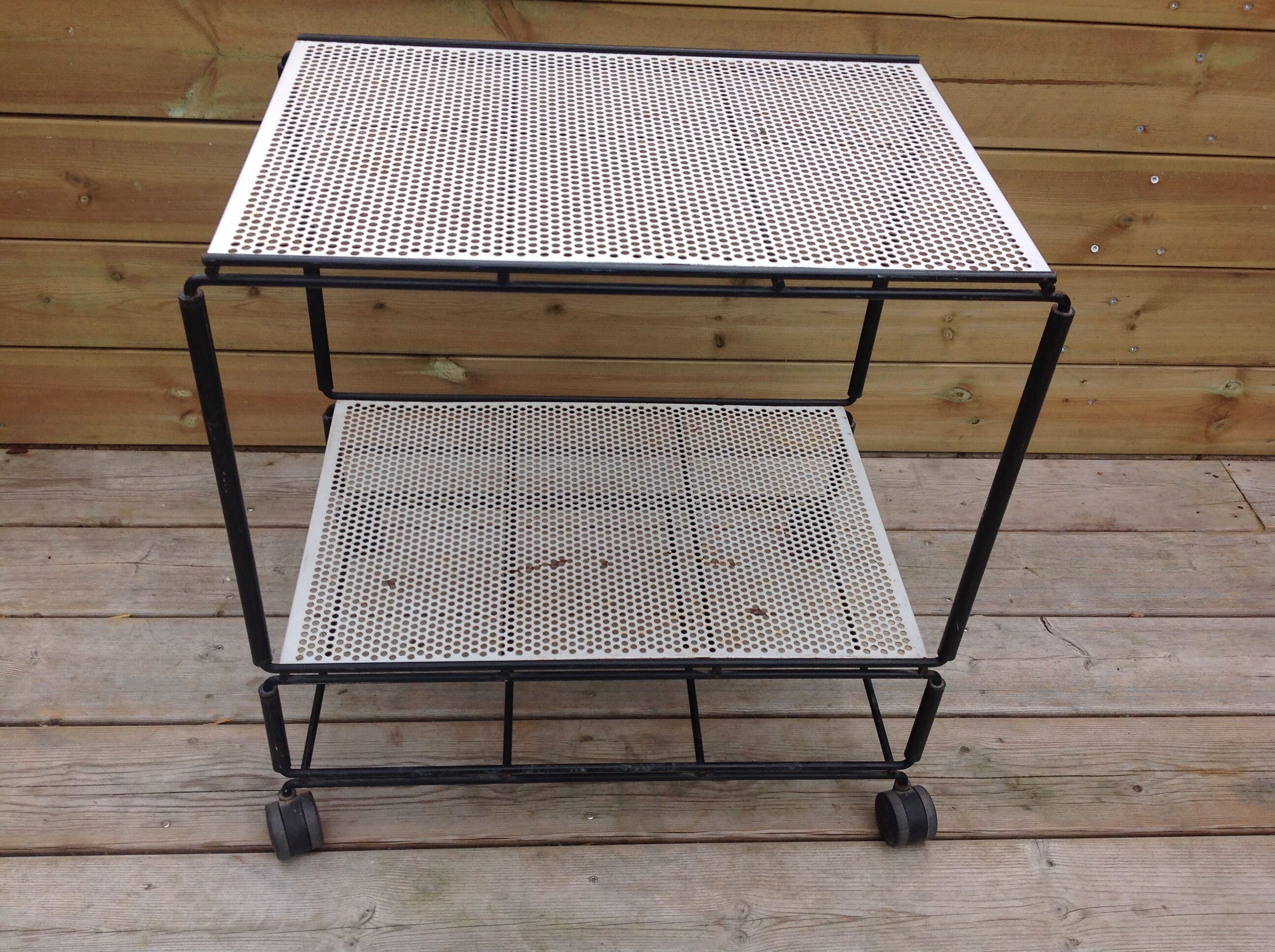 Perforated iron rolling table