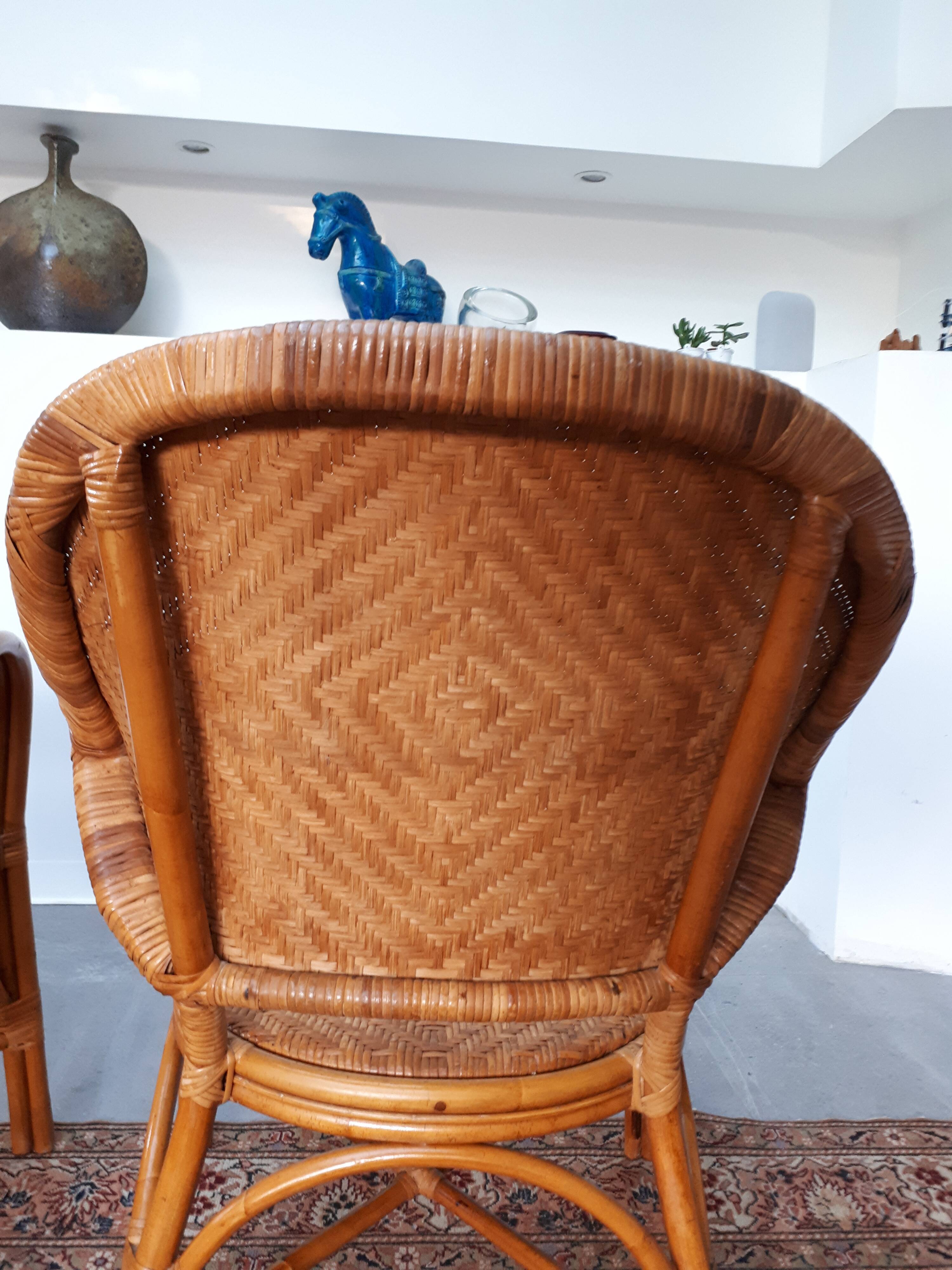 Pair of armchairs in braided rattan 70s