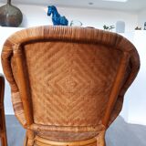 Pair of armchairs in braided rattan 70s