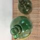 Pair of old demijohn bottles