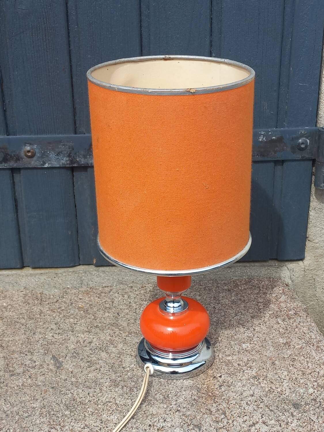 Designer lamp from the 70s in chrome metal and orange lacquered wood