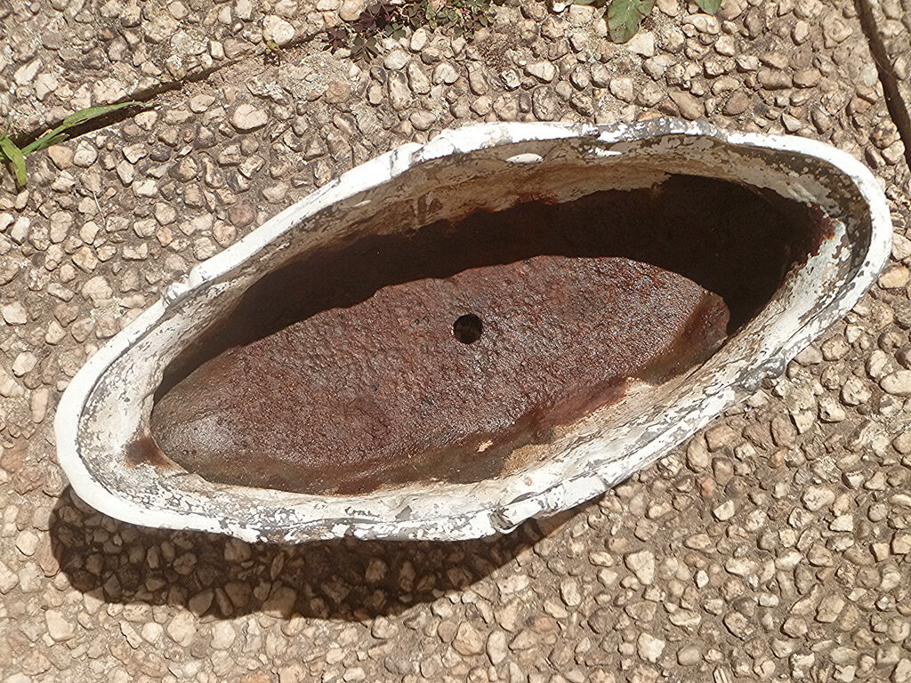 old cast iron planter