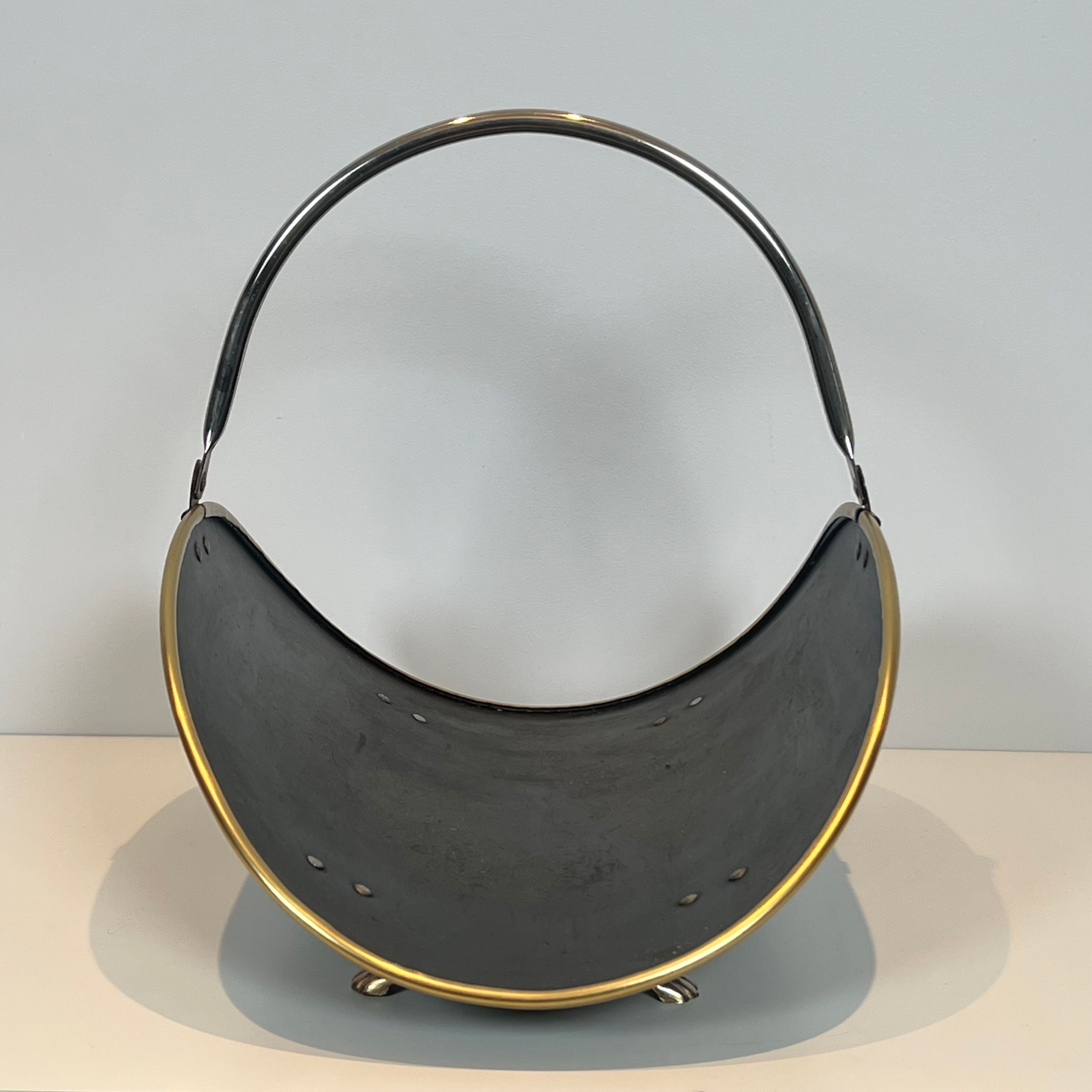 Neoclassical log holder in brass and black lacquered brass