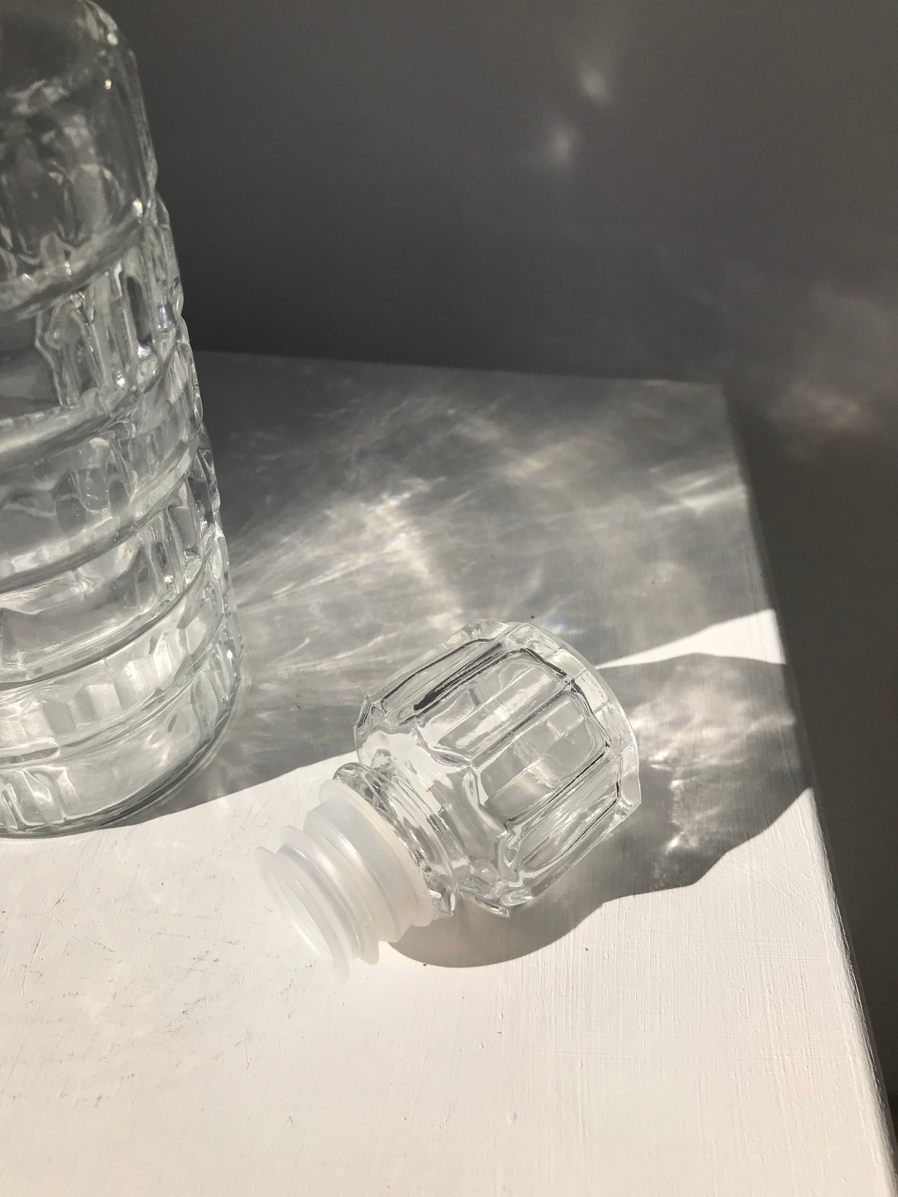 Vintage whisky decanter in glass