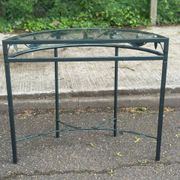 Grey-green wrought iron half-moon console with glass, 85cm.