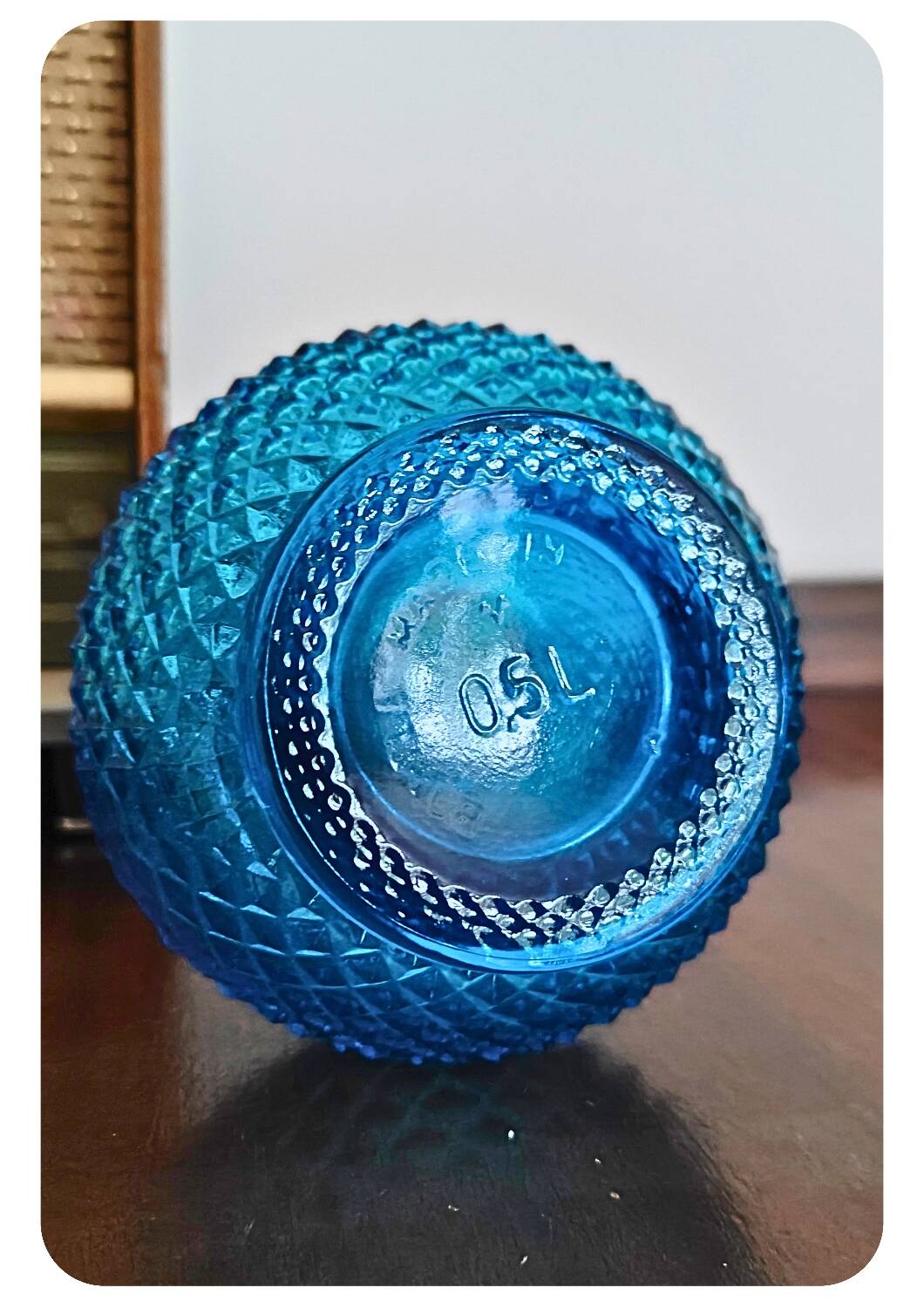 Bouteille en verre bleu belge vintage