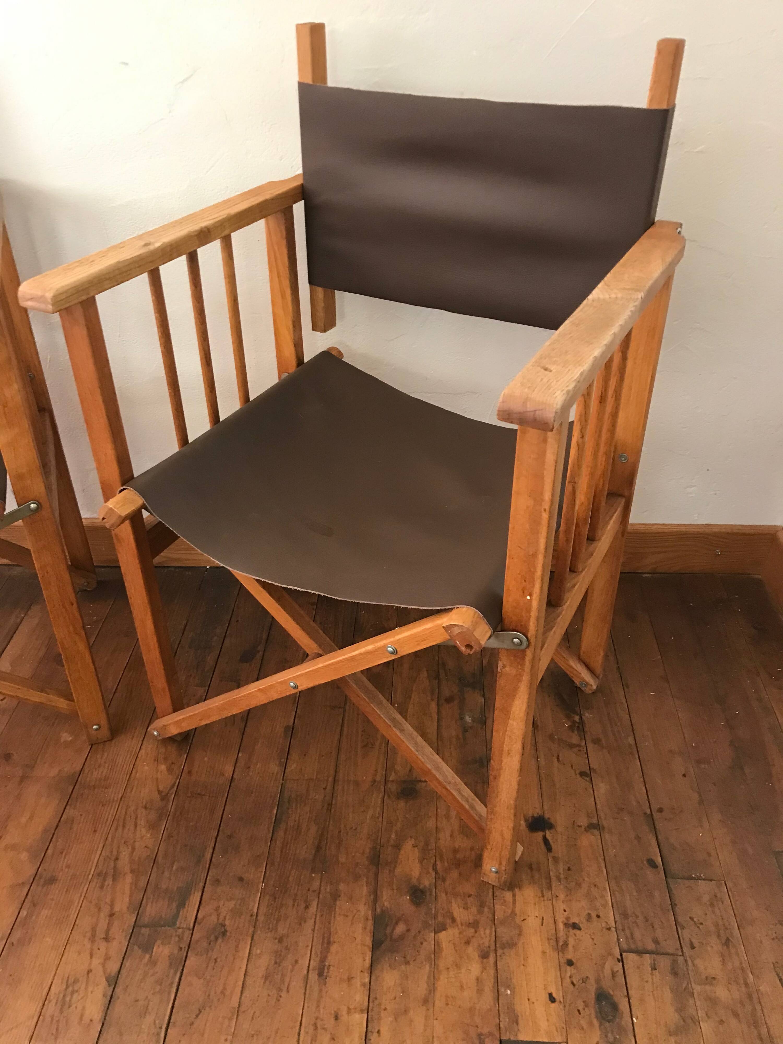 pair of Safari armchairs in wood and leather