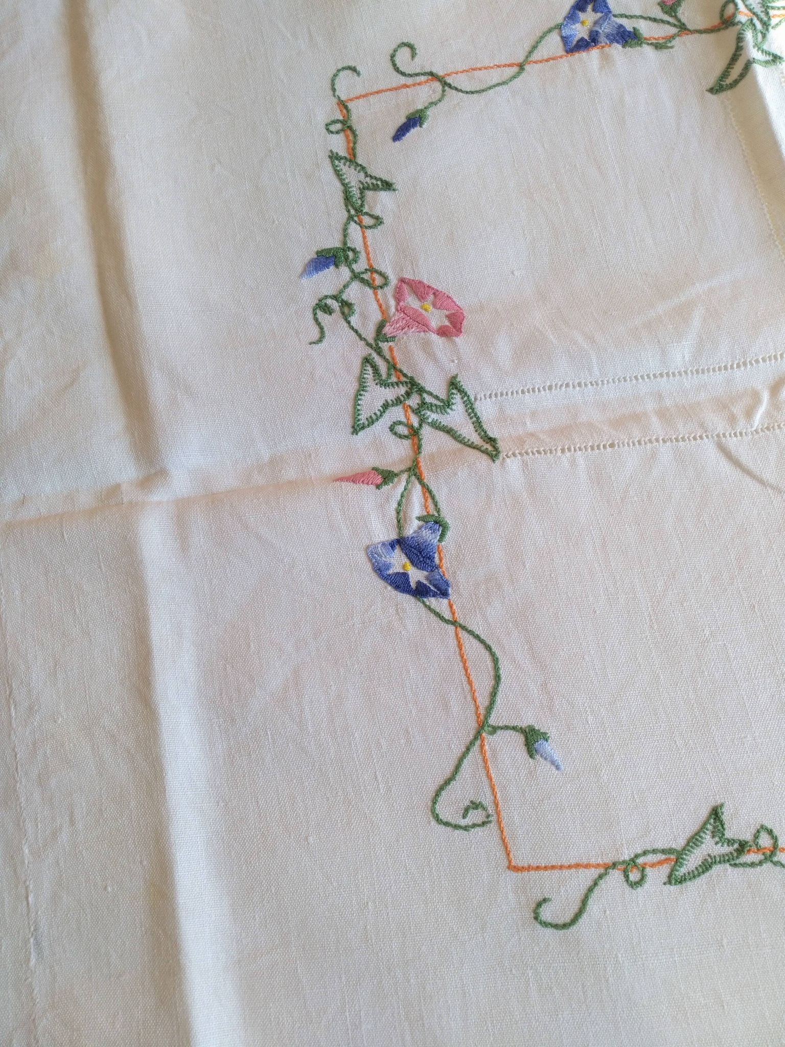 Antique linen tablecloth embroidered with flowers