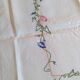 Antique linen tablecloth embroidered with flowers